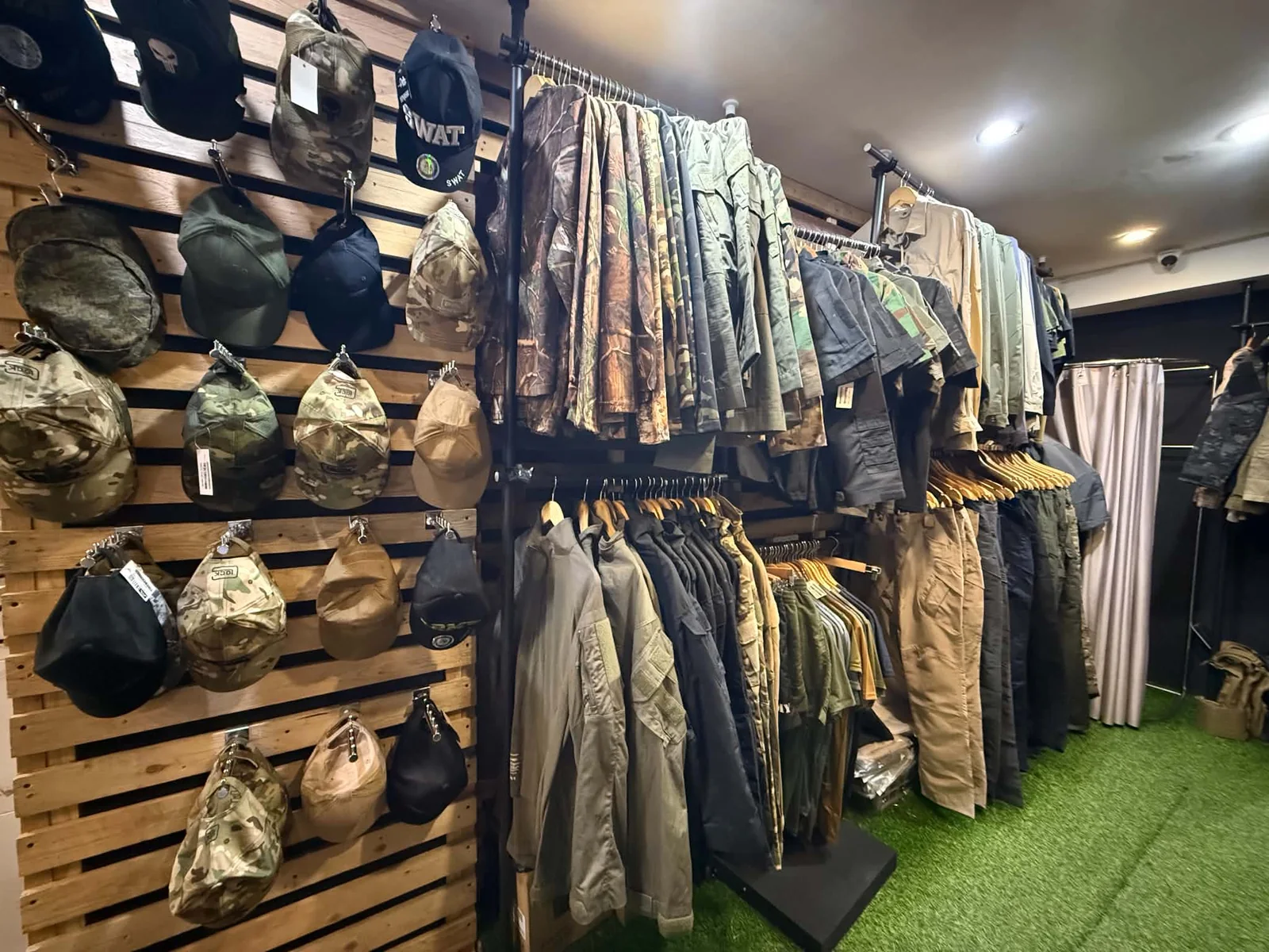 Tactical apparel, caps, and clothing display