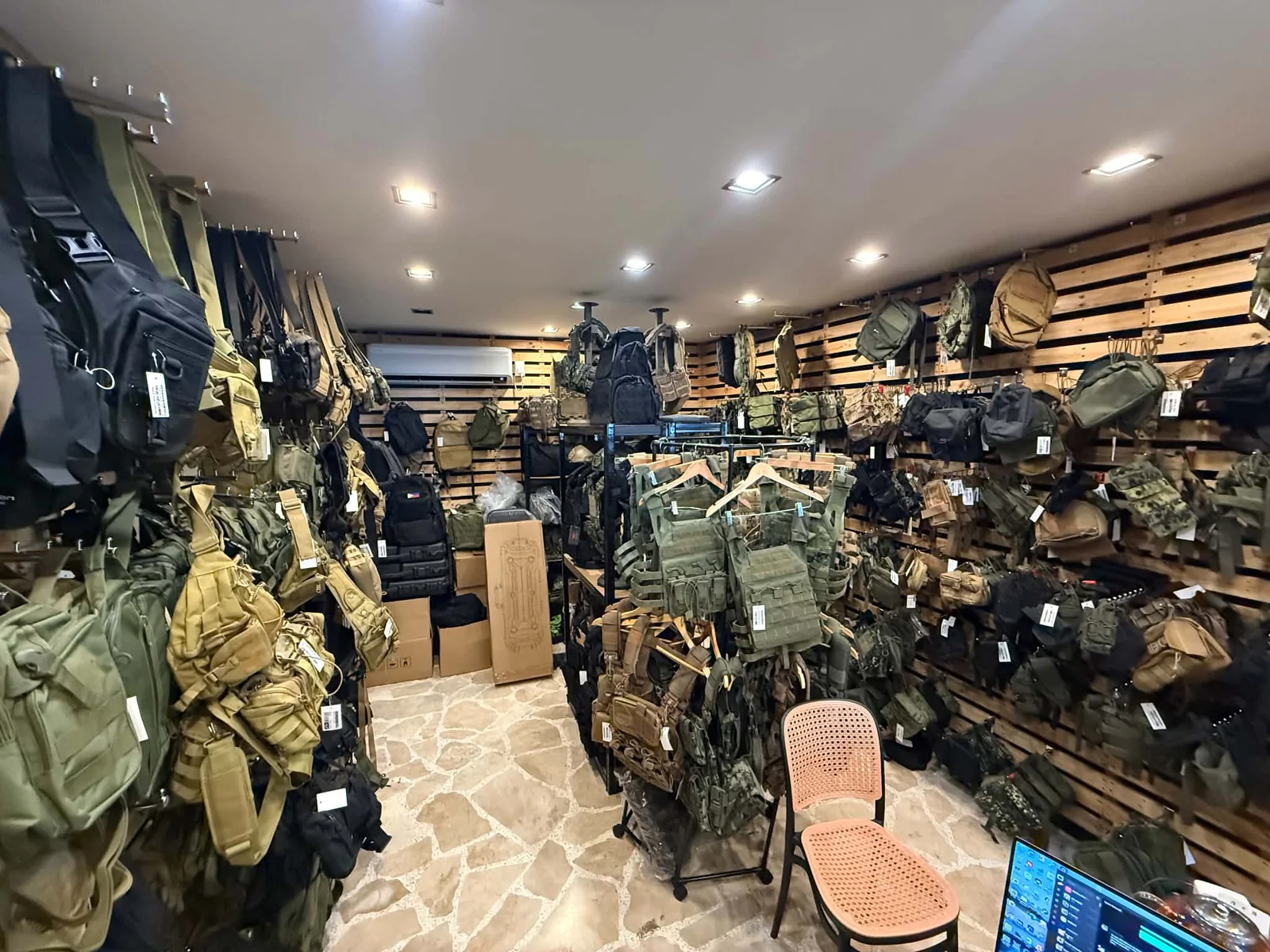 Inside the Tactical Joe store with tactical bags, apparel, and operational gear